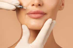 Woman’s lips as she gets lip filler injections in Salt Lake City, UT