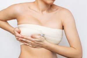 Woman's breasts with compression garments after breast reduction in Salt Lake City, UT